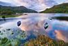 Boats on water in Killarney National Park
