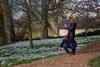 Couple taking pictures at Easton Walled Gardens