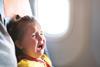 Crying child on a plane