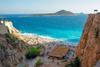 Antalya, Turkey, showing a lovely beach with blue sea.