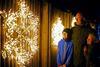 Family enjoying the light displays at Glow Marwell