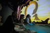 A family explores the new exhibits at the Loch Ness Centre in Scotland