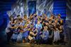 Mazz Murray (centre) as Donna with the cast of Mamma Mia at the Novello Theatre