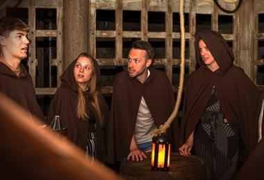 A group taking part in the Gunpowder Plot immersive experience in London