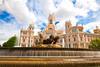A fountain and historic building Madrid, Spain
