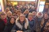 Members of Theatre Trips Essex outside the London Palladium before a show