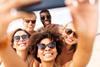 A group on holiday taking a selfie