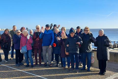 Milton Village Community Association group members on the seafront