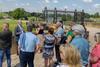 Members of the Coach Tourism Association enjoying a tour of Blenheim Palace's gardens in Oxfordshire