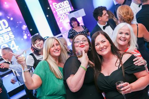 Guests dancing and smiling at the 2024 GLT Awards